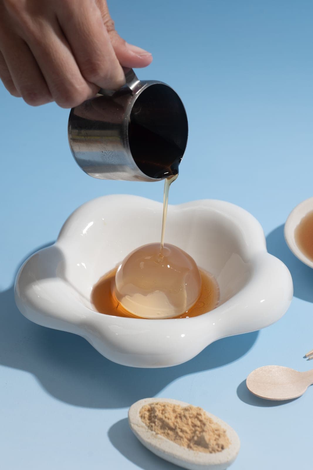 Translucent warabi jelly glistening in syrup